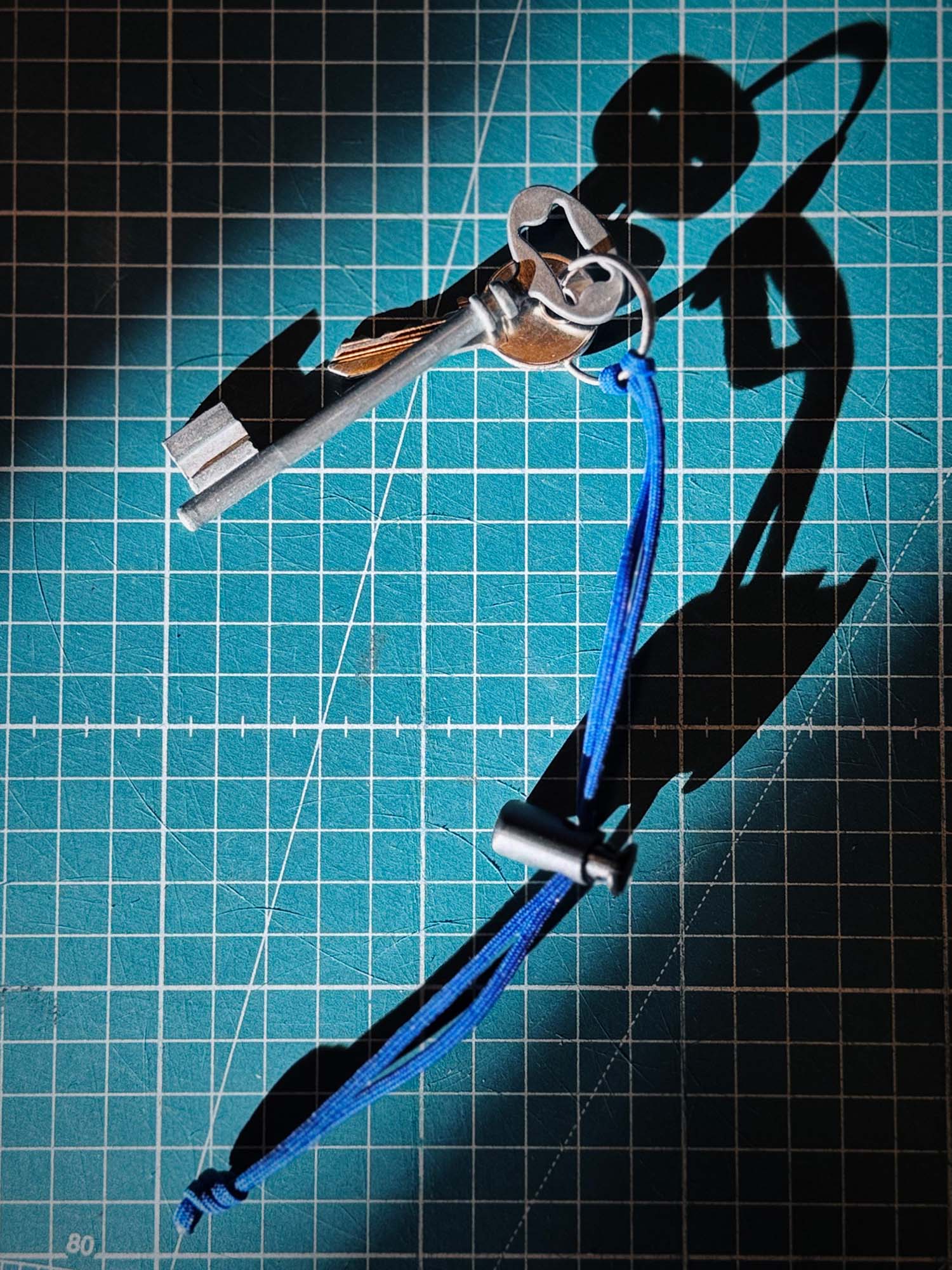 Porte-clés et sangle de dépannage